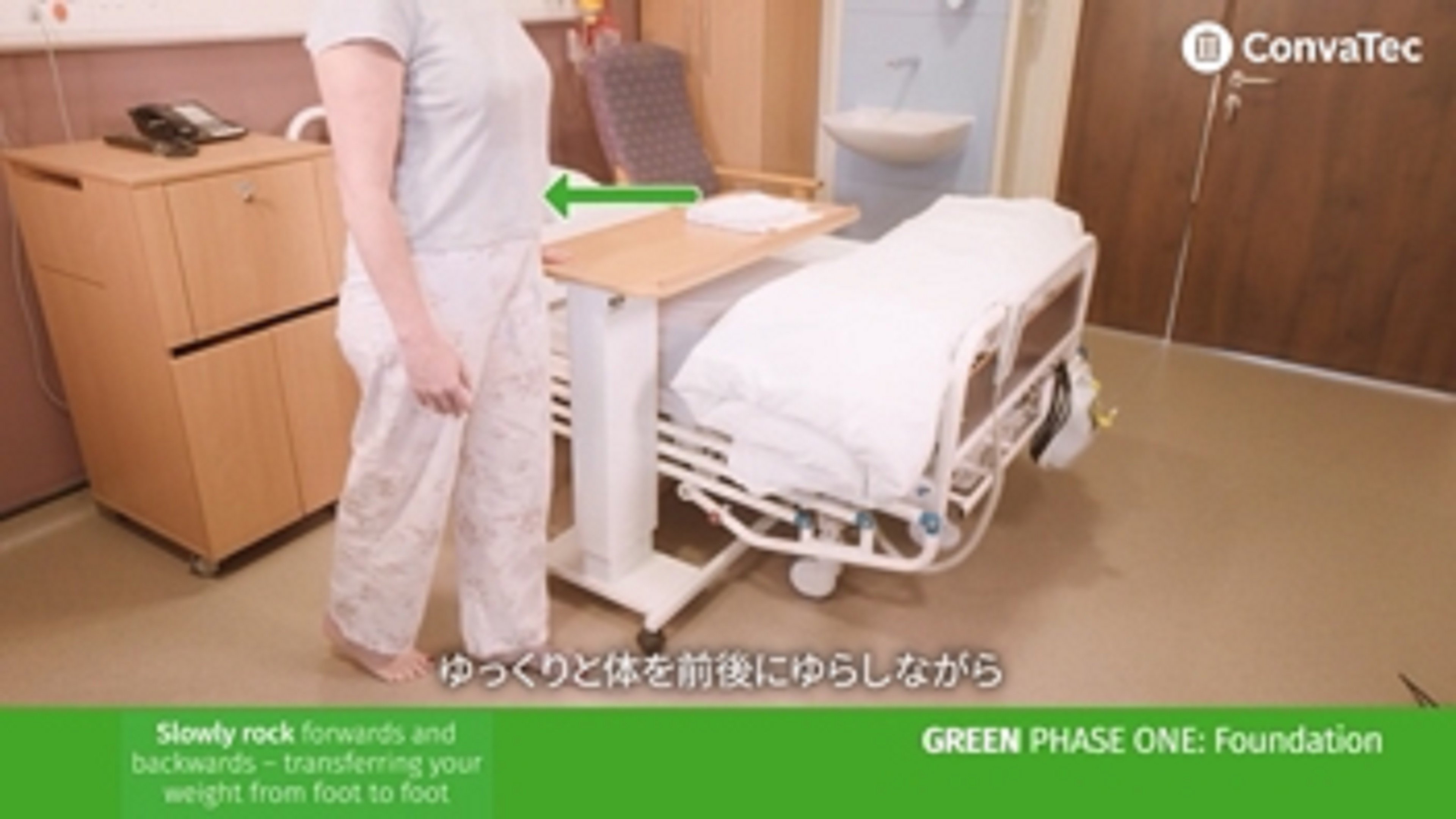 a person standing next to a hospital bed