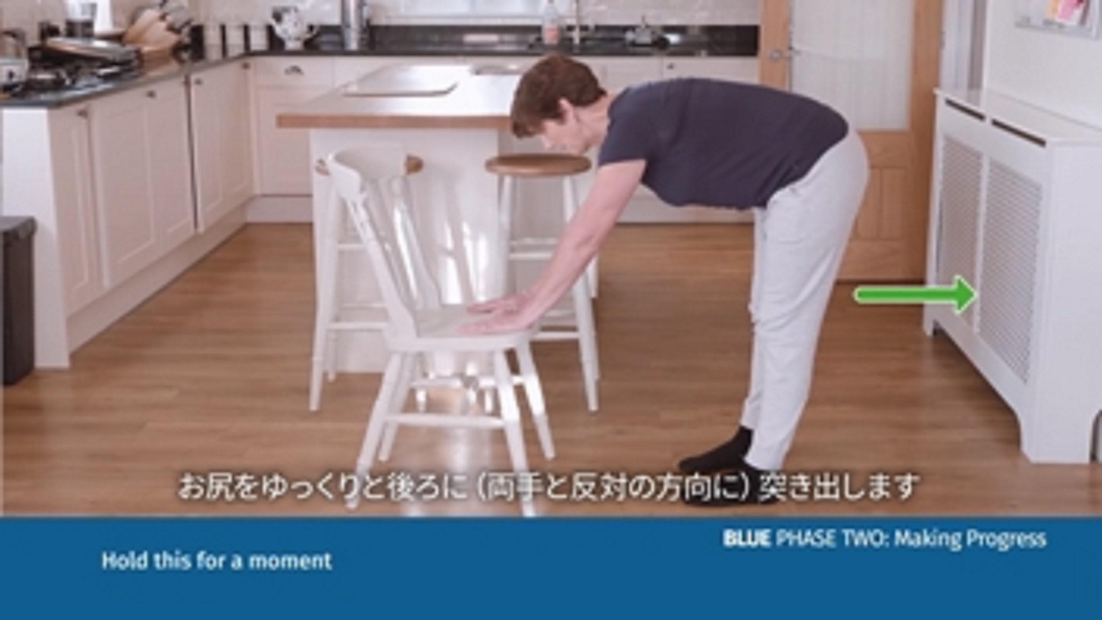a person bending over a chair