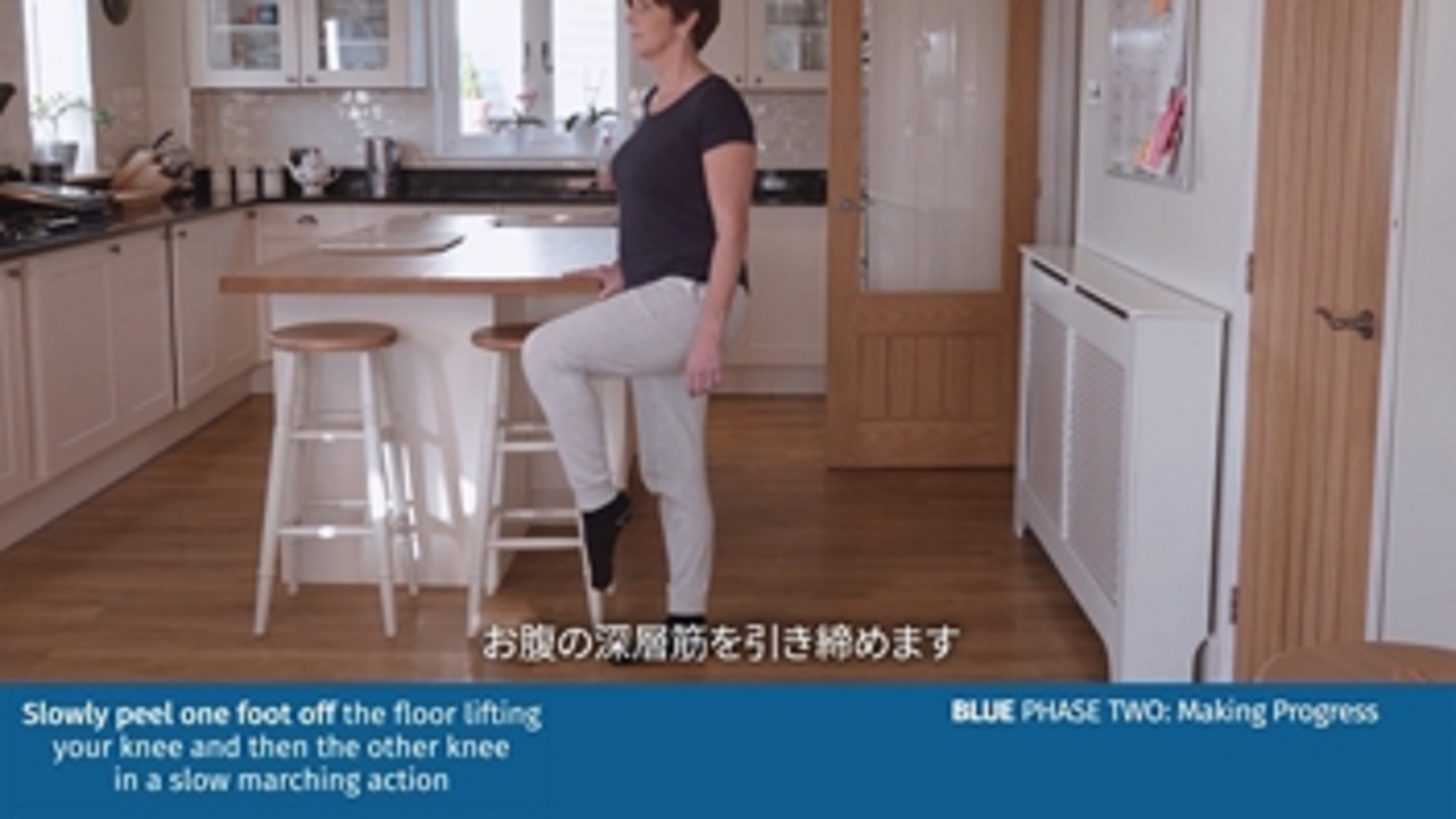 a person standing in a kitchen